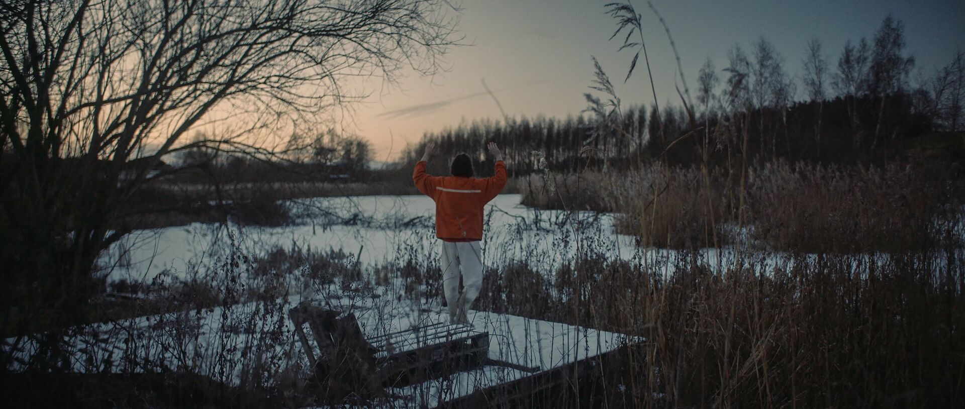 The monk stretching by a lake, 70% Selfless