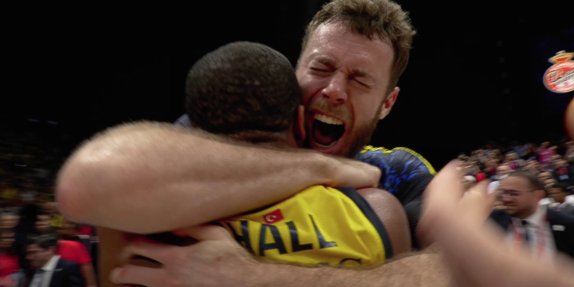 Fenerbahçe players embrace after winning the EuroLeague title, Chasing Glory