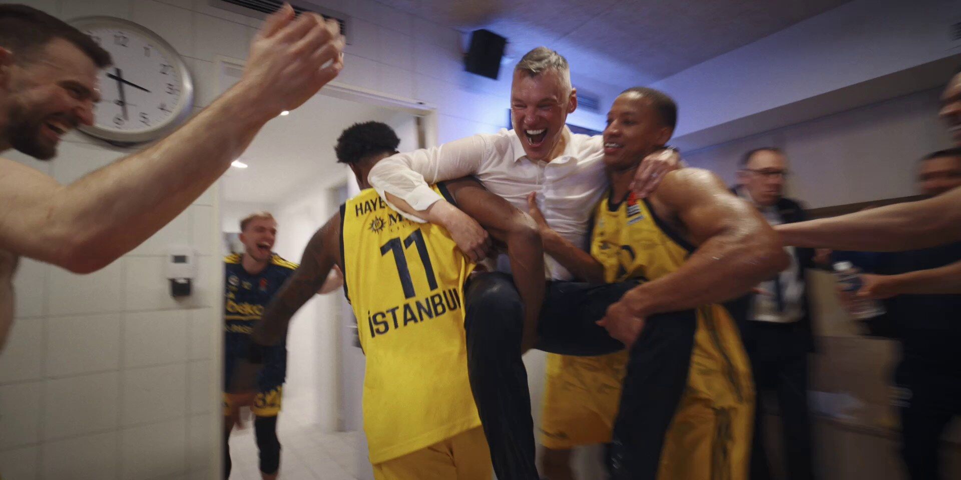 Fenerbahçe players celebrate the EuroLeague title, Chasing Glory