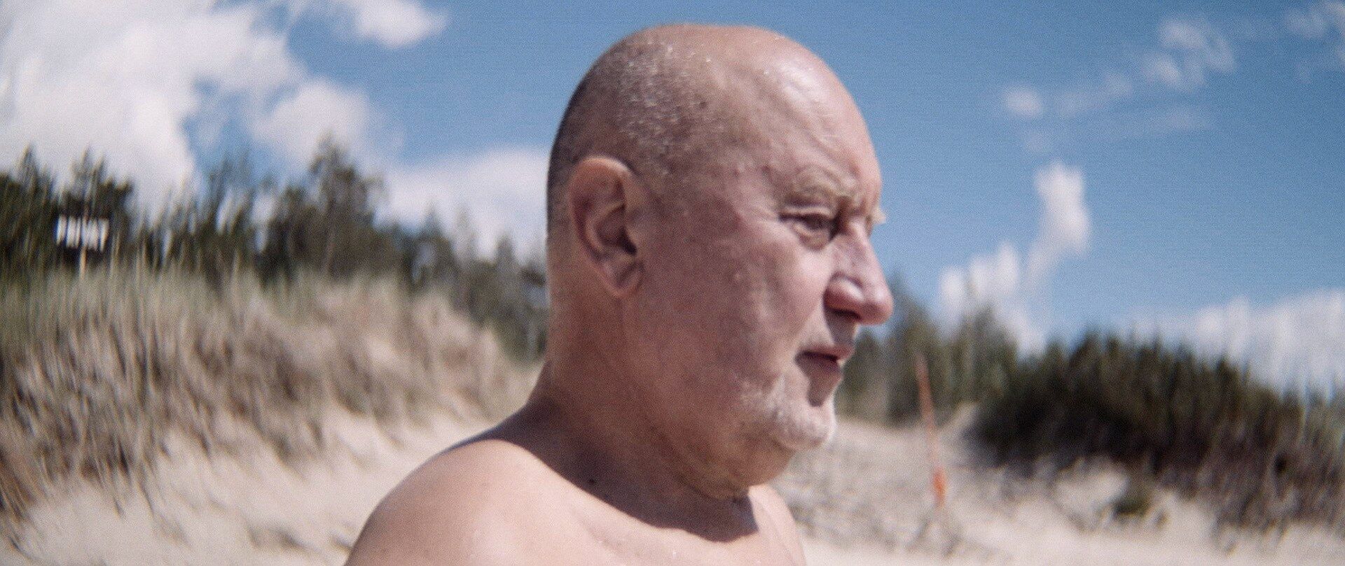 Romualdas Požerskis on the beach, Under the Red Light
