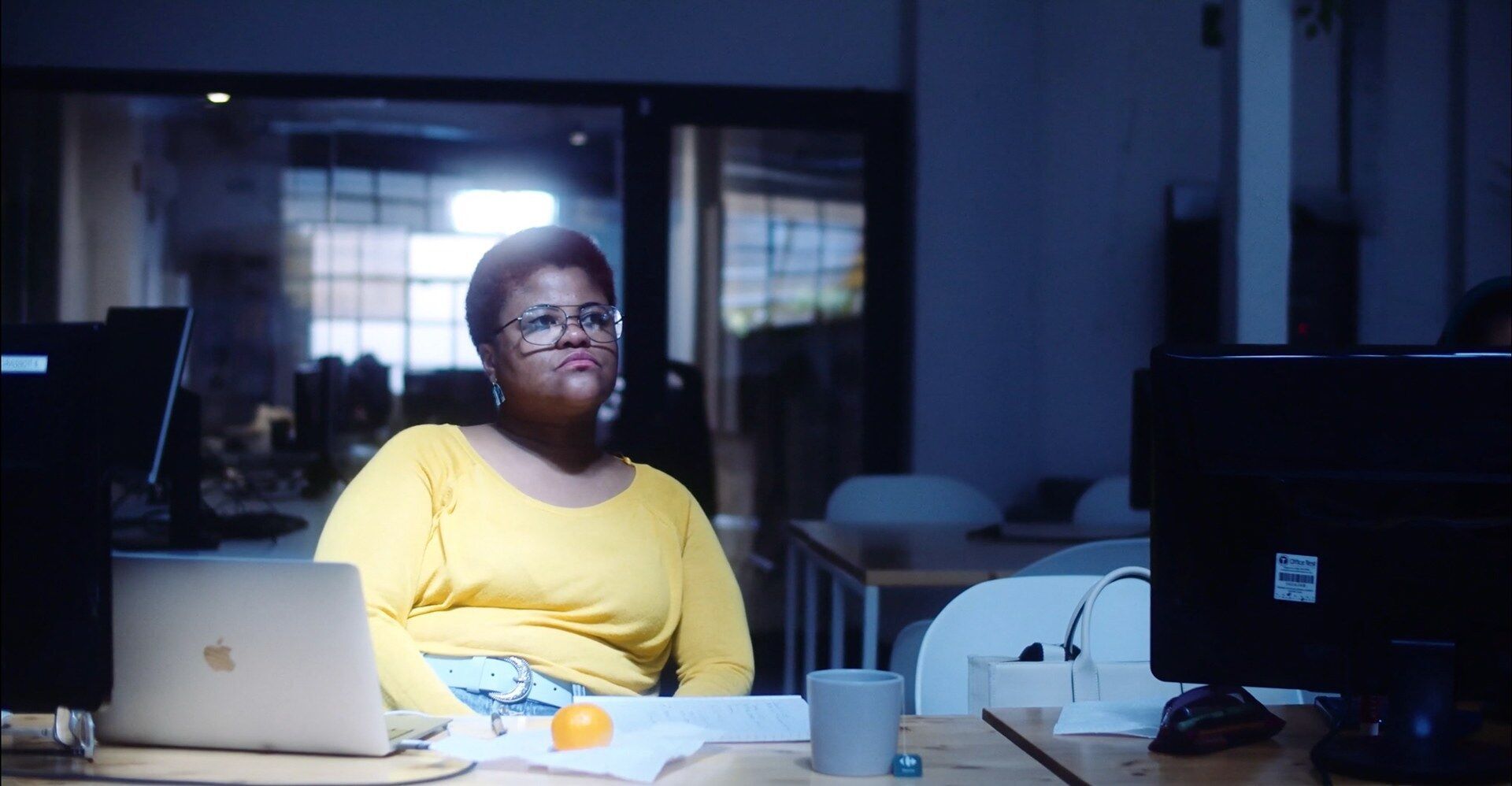 A CodeOp student at her laptop, Women in Tech